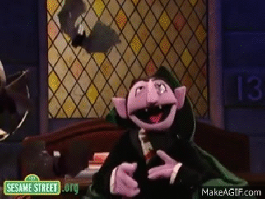 The Count Sesame Street laughing gif